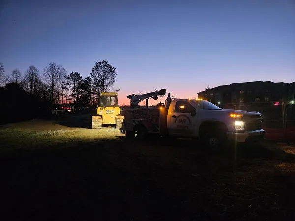 Hydraulic hose replacement on a compact excavator